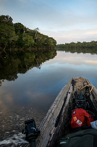  
Traveling up tributary of the Orinoco River by canoe in Colombia 